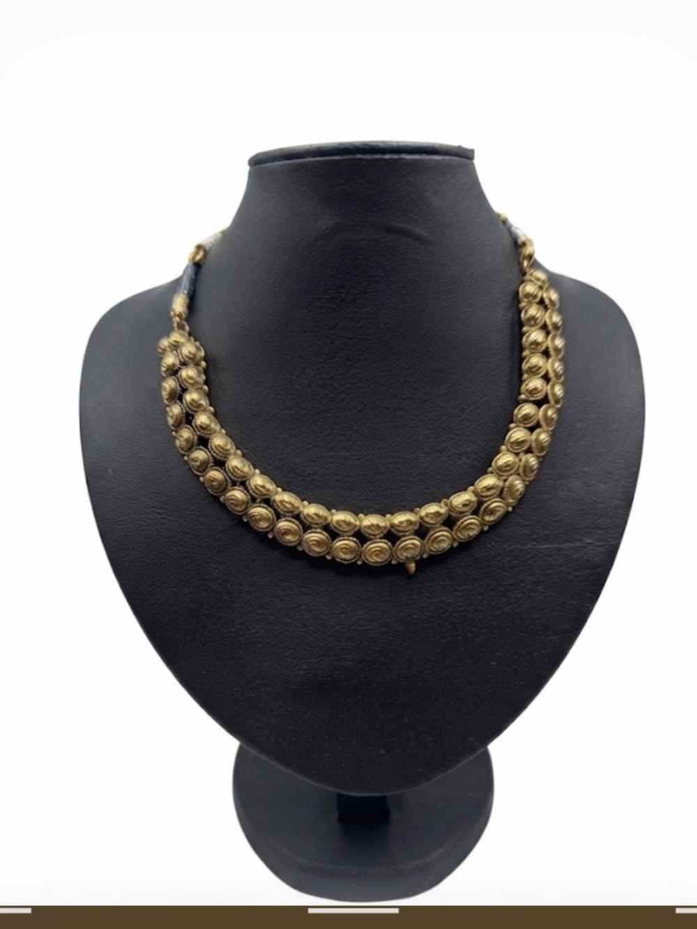 Indian bridal necklace features two layers of 24k gold-plated spherical beads